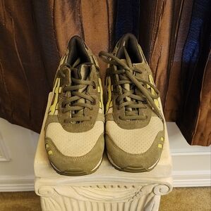 Boys Asics tennis shoes size 6 1/2 women's size 7 1/2 to 8.  Olive cream yellow